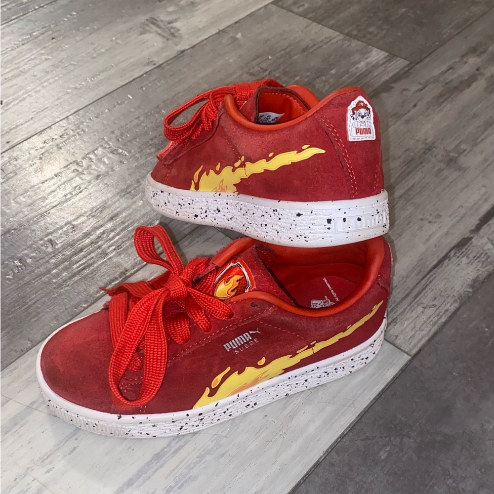 Puma Red Sneakers with Yellow Flame Design